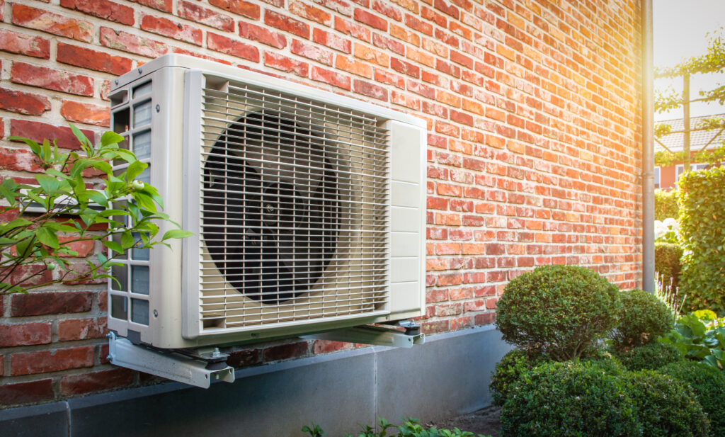 A close-up of a dusty air vent that may be hiding mold spores.